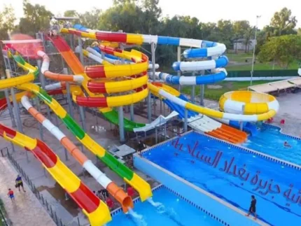 Outdoor water park construction with colorful fiberglass water slides